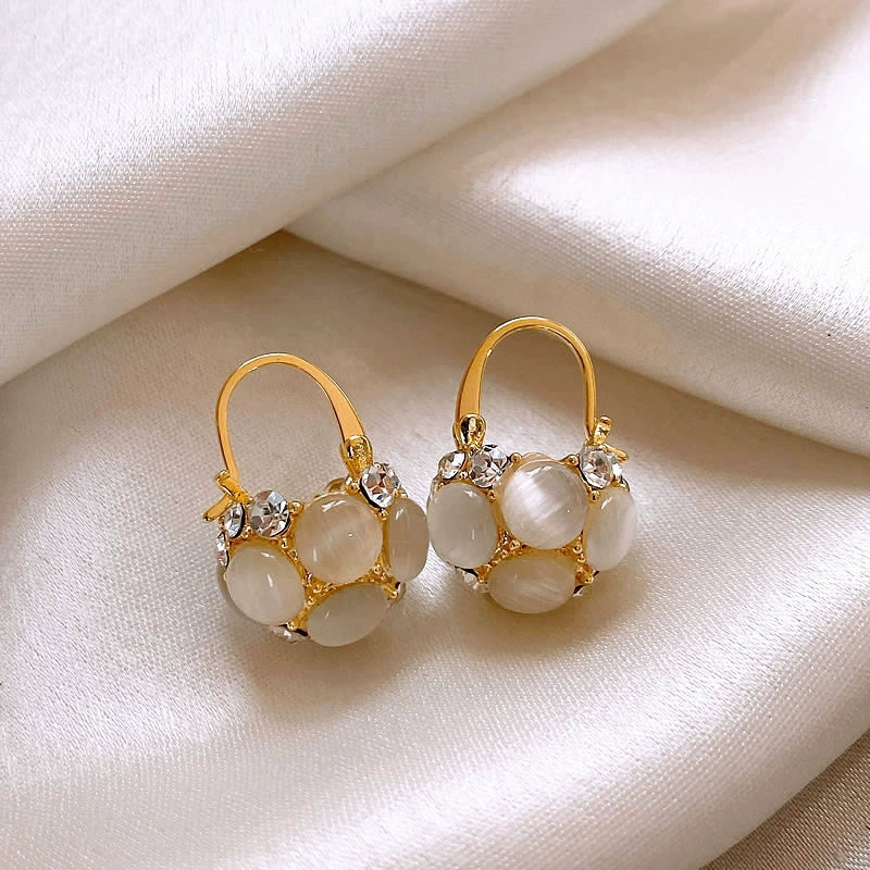 Aretes Cesta Real