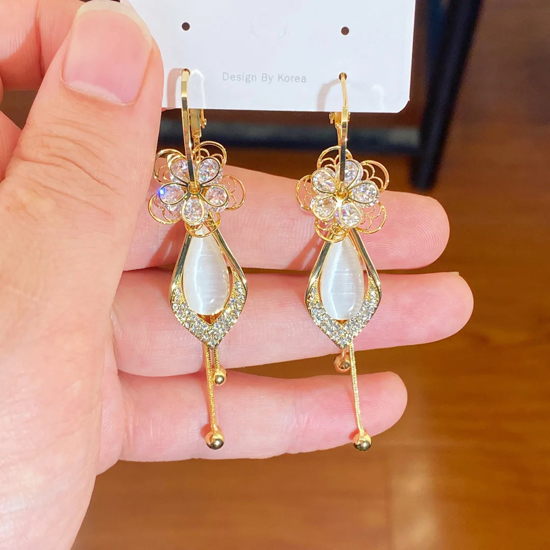 ARETES FLOR DE OPALO