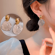 Aretes Coraza