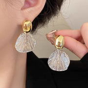 Aretes Coraza