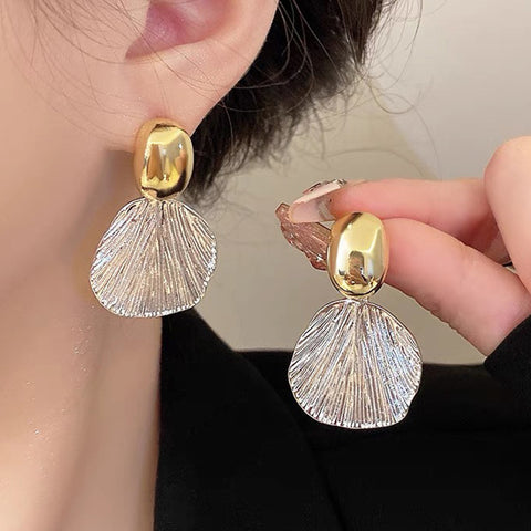 Aretes Coraza